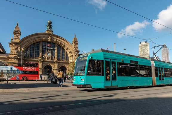 Turquoise Tram type R in front of Frankfurt Central Station