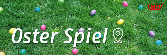 Eine grüne Wiese mit kleinen bunten Eiern und der Aufschrift "Oster Spiel". Oben rechts MTV-Logo in rot.