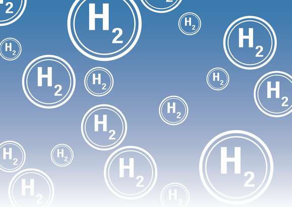 Weiße Wasserstoffsymbole H2 vor blauem Hintergrund