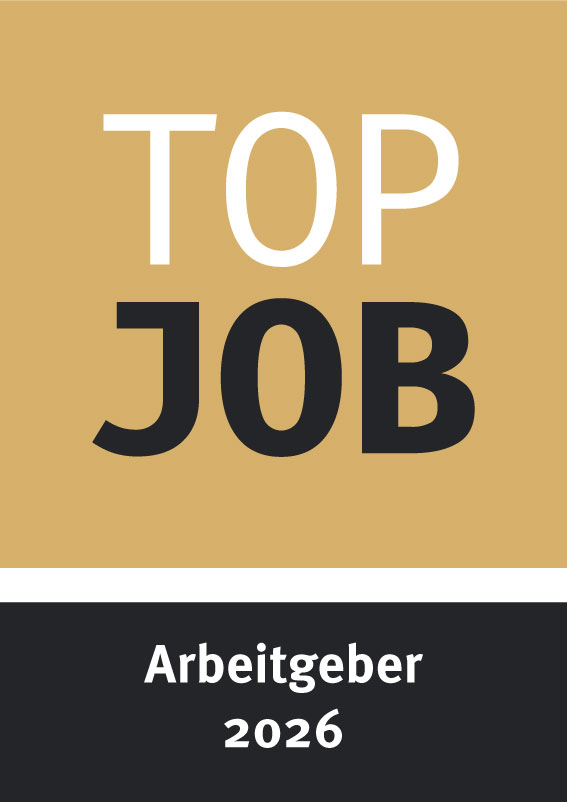 Grafik in Gold und Schwarz mit Aufschrift TOP JOB Arbeitgeber 2026.