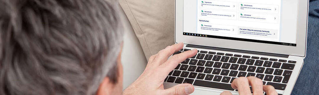 Mann mit Laptop, Blick auf meinRMV