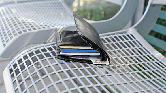 Wallet on a bench on the platform