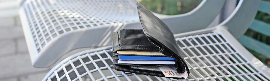 Wallet on a bench on the platform