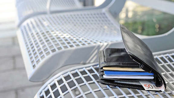 Wallet on a bench on the platform