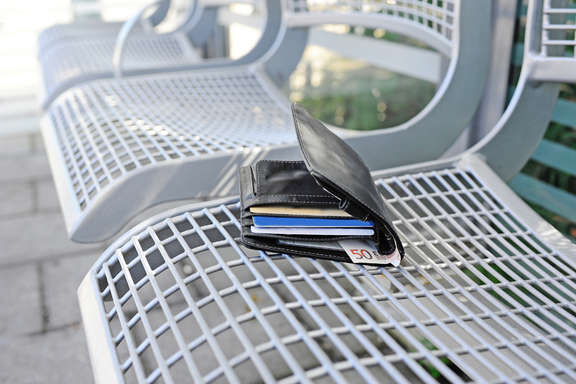 Wallet on a bench on the platform