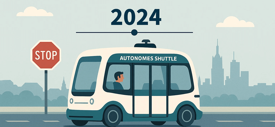 Autonomes Shuttle mit Fahrgast auf Straße.